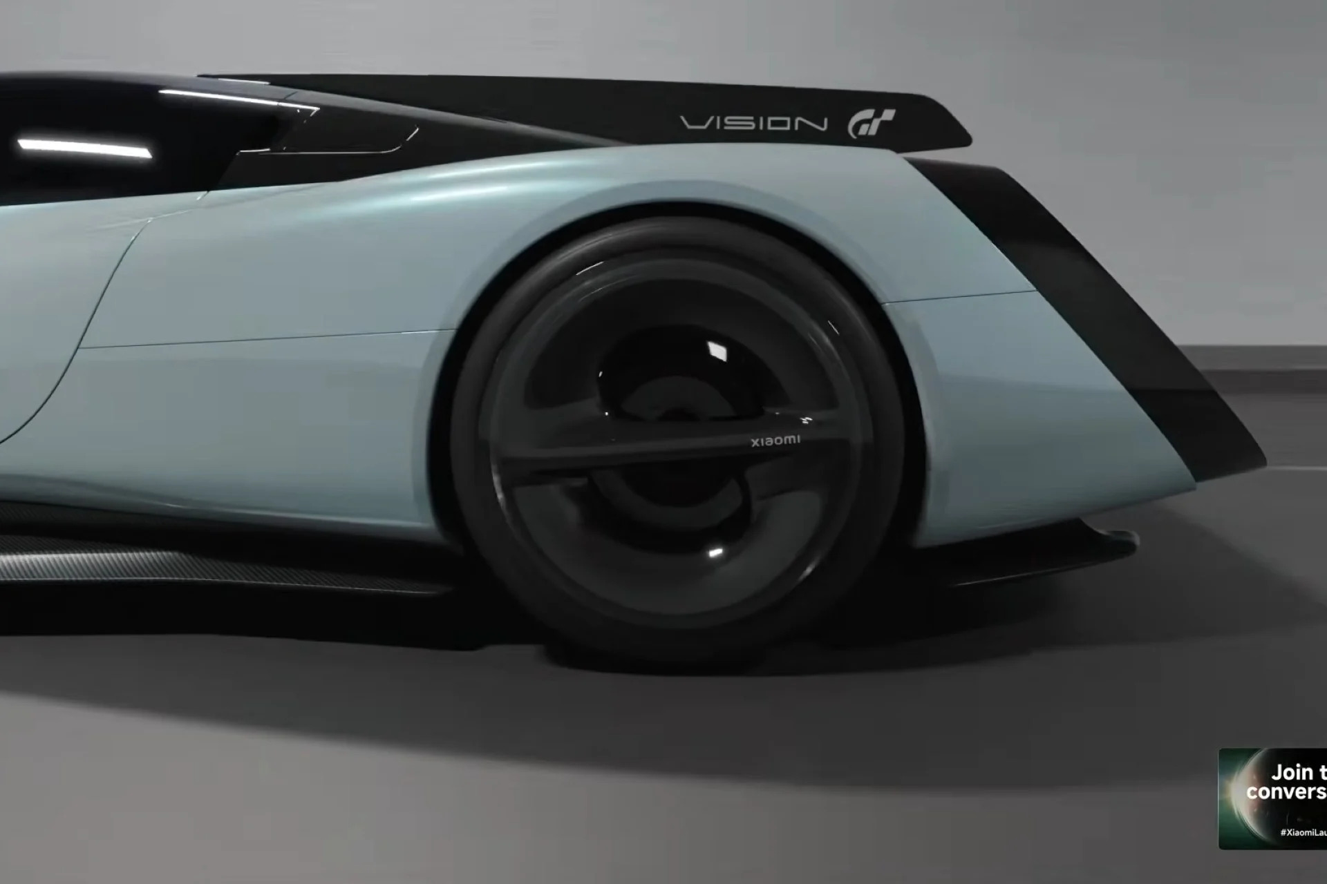 Vista lateral del hypercar eléctrico Xiaomi Vision Gran Turismo en un entorno minimalista