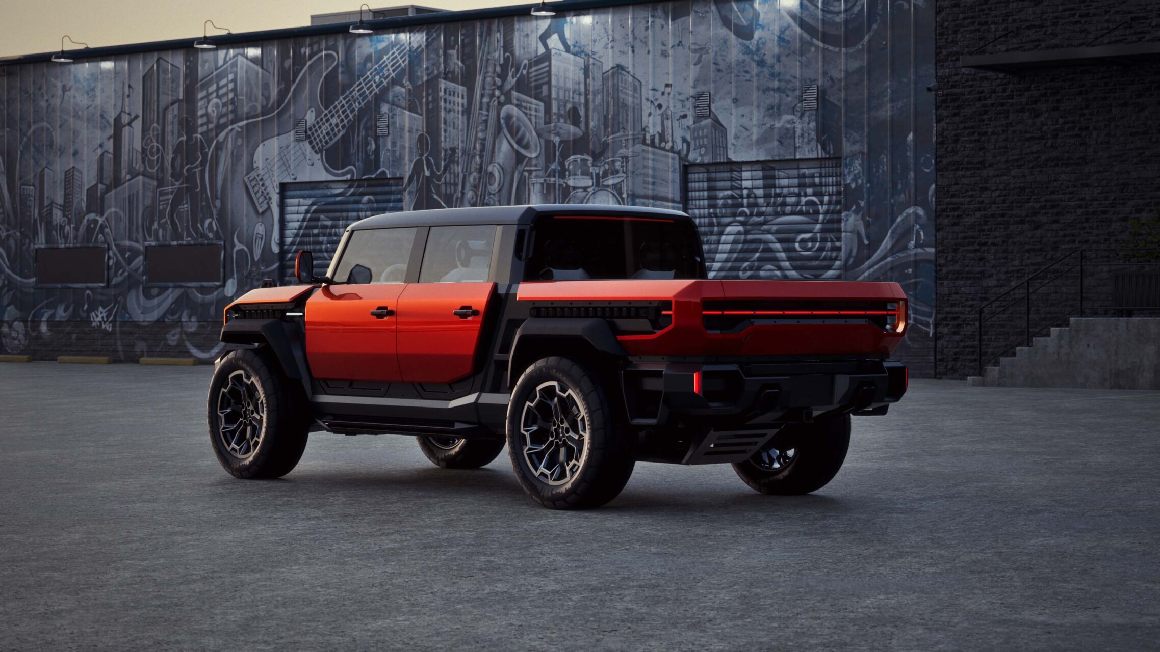 Vista trasera del GMC HUMMER X en un entorno urbano con grafitis