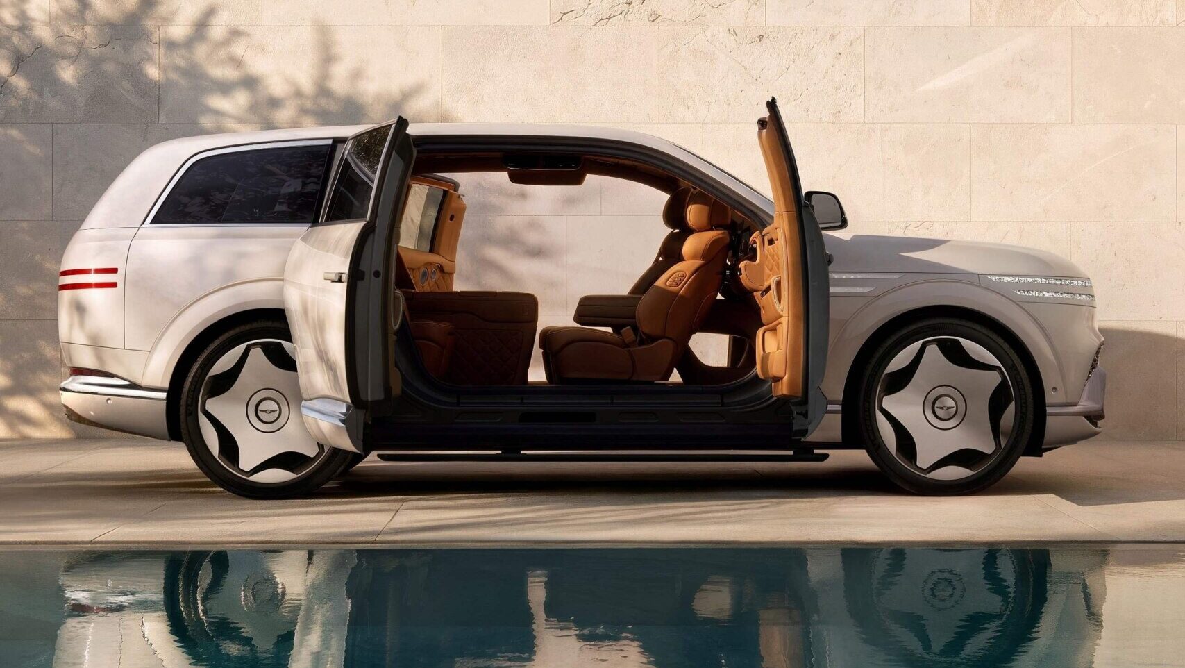 Genesis GV90 SUV eléctrico de lujo con puertas abiertas y diseño contemporáneo