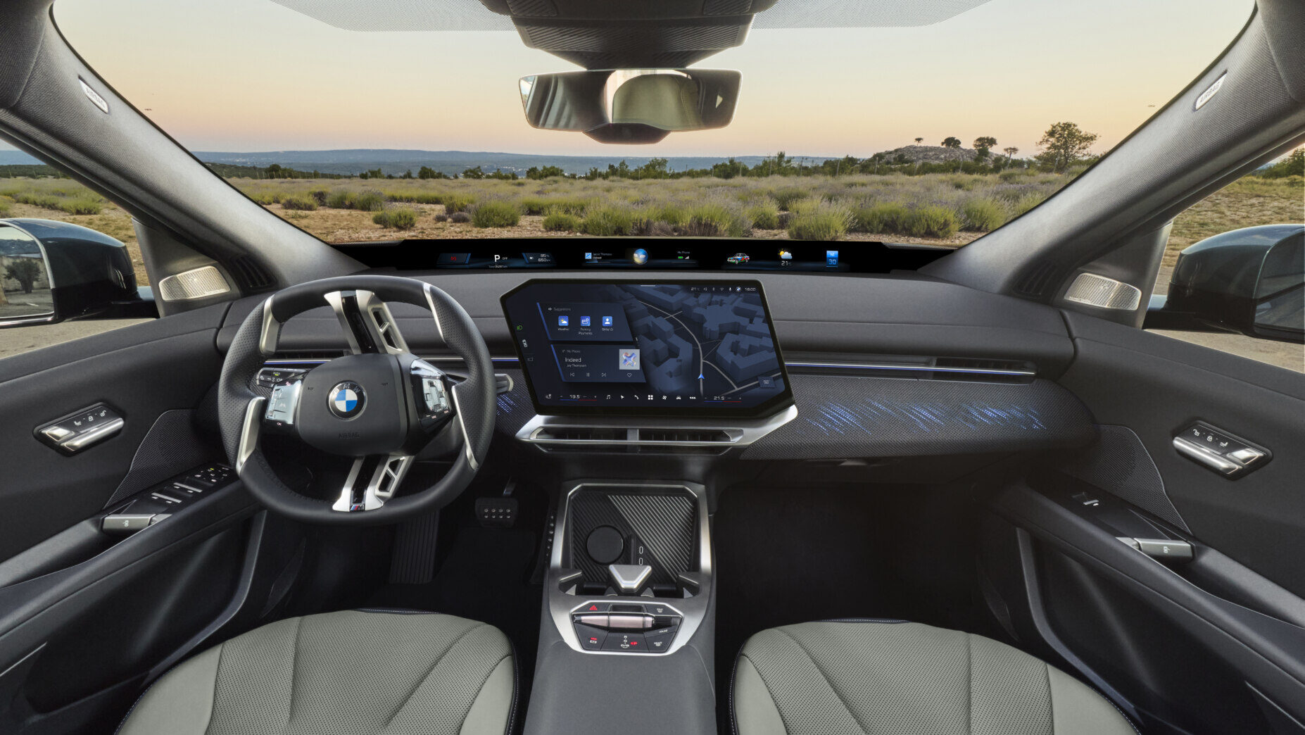 Interior del BMW iX4 2026 con diseño moderno y tecnológico