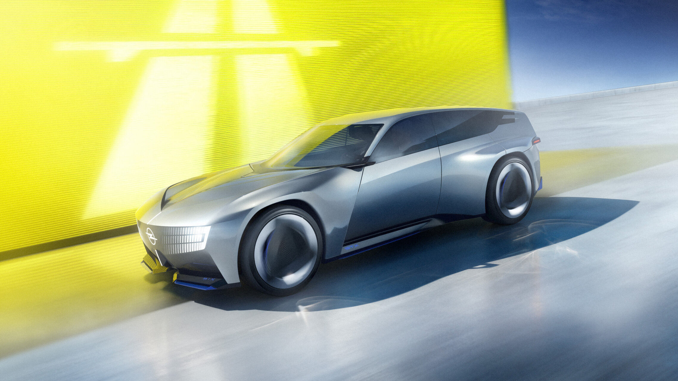 Ilustración de un Opel STX Concept plateado visto de frente y de lado.